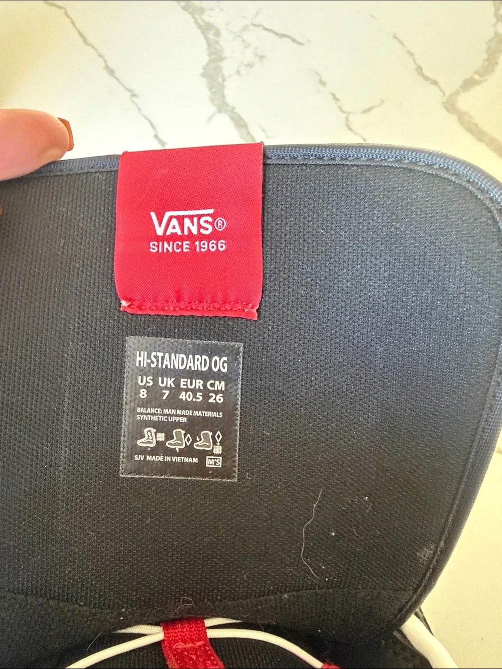 Vans Black and White High-Top Snowboard Boots